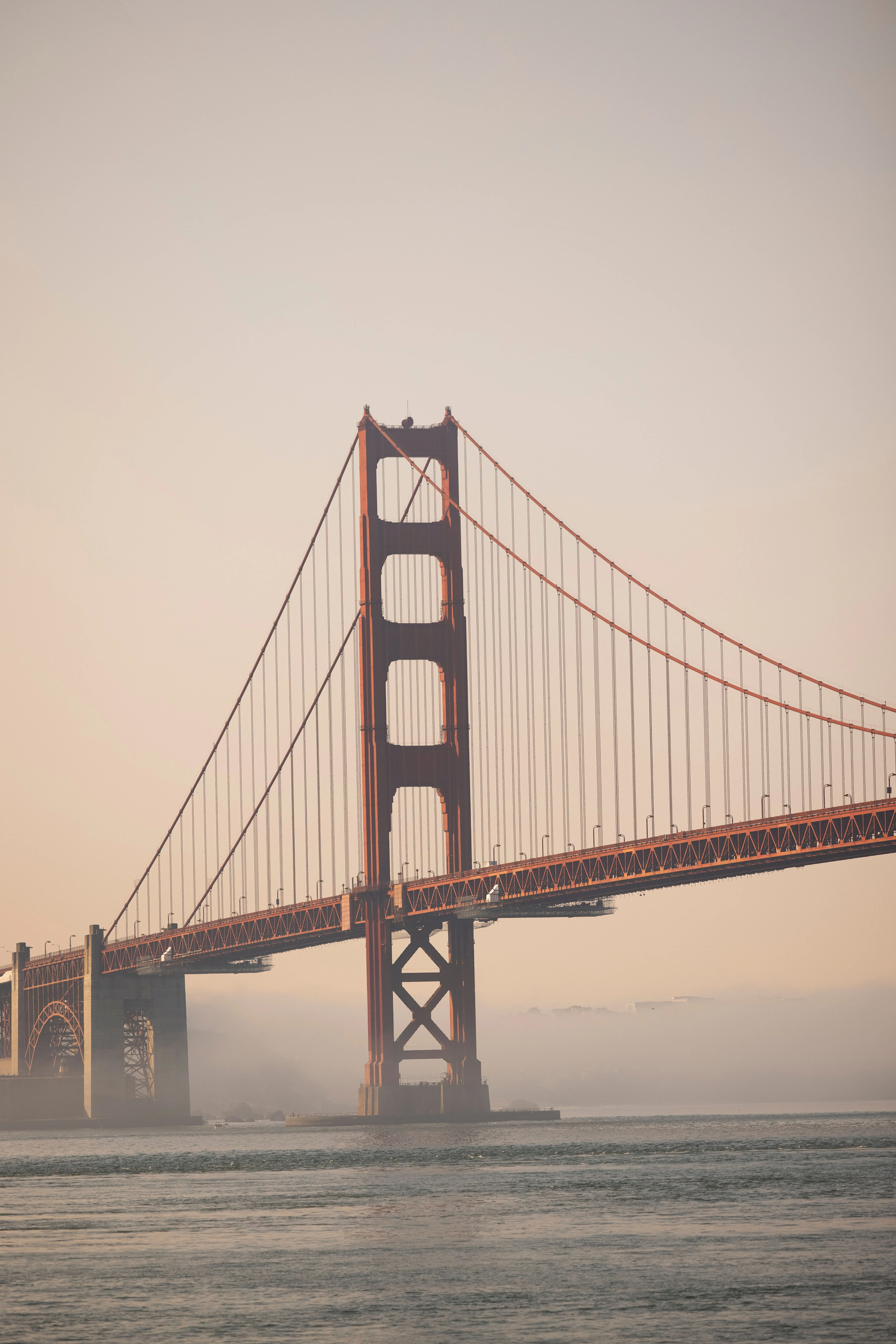 Golden Gate Bridge in warm morning light above San Francisco Bay